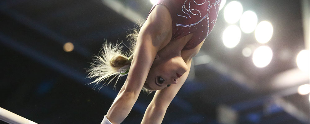 gymnast on uneven bars